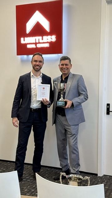 Lawrence with his top-performing agent trophy